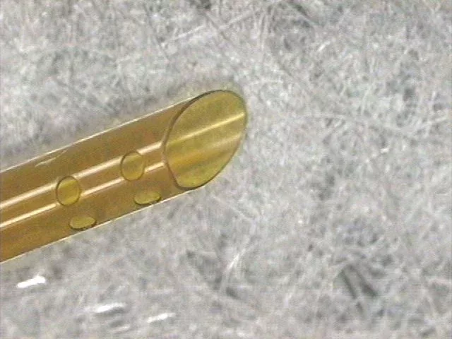 Laser micromachining of Kapton tube