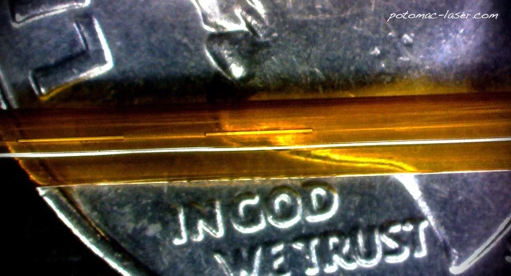 Small Slots in Polymer Tubing