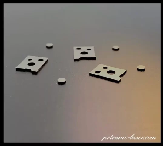 High speed laser cutting of small metal parts.